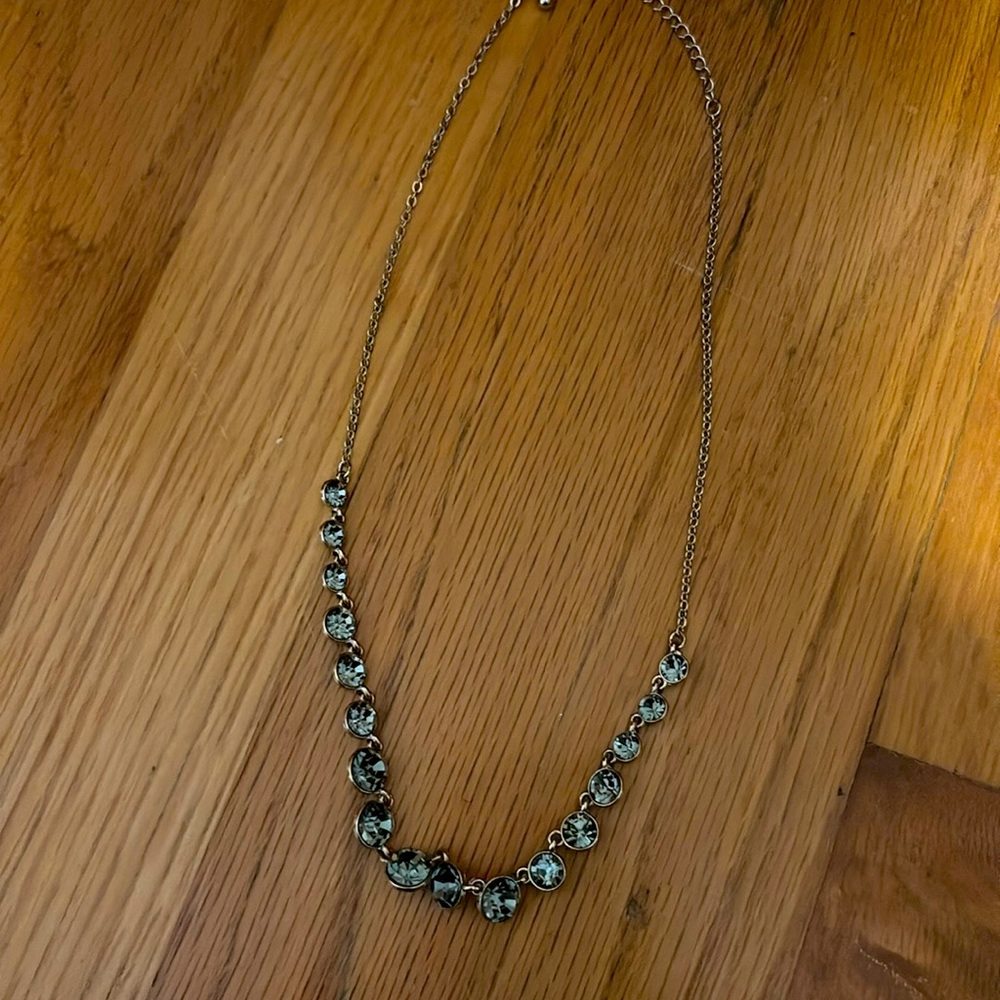 Gold with grey stones statement necklace.